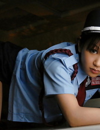 Little Chinese beauty in uniform slowly uncovering her fuckable curves