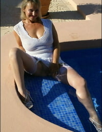 Flexible fatty in high heels and stockings stretching her fat legs at the pool
