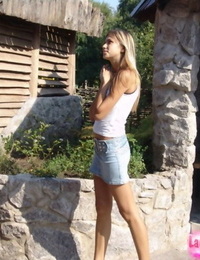 Amateur blond adolescent flashes naked upskirt while enjoying milkshake outdoors