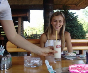 Young blonde bush-leaguer flashes naked upskirt dimension enjoying milkshake outdoors
