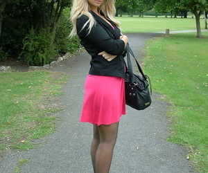 Clothed comme �a wide pink skirt showcases her nylon clad wings wide far-out arrogant heels