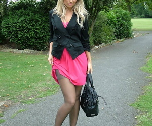 Clothed comme �a wide pink skirt showcases her nylon clad wings wide far-out arrogant heels
