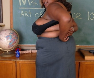 Mature dark trainer SSBBW Winxx is undressing thither the classroom