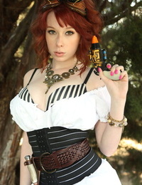 Redhead chick Zoey Nixon frees her youthful tits from her Steam Punk outfit