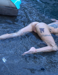 Tattooed solo female Anna Bell Peaks chicos soaking soaked in a bikini