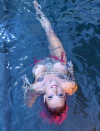 Tattooed solo female Anna Bell Peaks chicos soaking soaked in a bikini