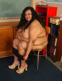 SSBBW teacher Debrina letting her massive saggy tits loose in classroom