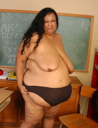 SSBBW mentor Debrina letting her massive saggy tits loose in classroom