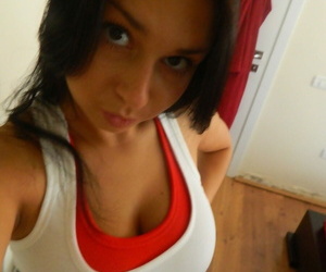 Dark haired tiro Aubrey Paige takes selfies as she exposes their way hot body