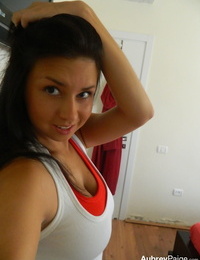 Dark haired amateur Aubrey Paige takes selfies as she exposes her hot body