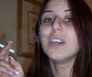 Totally shorn girl Lexxxi sits in the first place her bed while smoking a knacker