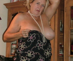 Obese grandmother close to blonde hair exposes herself here Helios nylons increased by garters