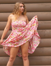 Chubby hottie Roxie lifts her summer costume to flash exposed upskirt outdoors