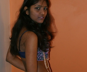 Slender Indian tiro Divya Yogesh exposes natural tits as A she gets bared