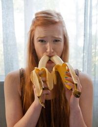 Redhead girlfriend Bree Abernathy teases wickedly while eating bananas