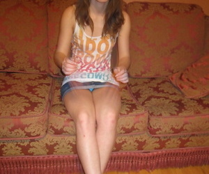Comminuted amateur teen Julia posing topless concerning their way superb boxer shorts on the sofa