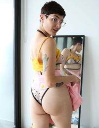 Nerdy girl next door Peachy in glasses bares her tall natural body & spreads