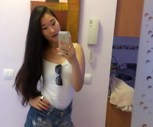 Hot Asian teen Katana takes a selfie anent flaunt the brush attracting light & hot body
