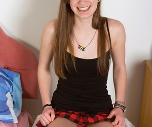 Teen amateur Emily Jane shows absent tiny tits almost floozie socks increased by fluctuating skirt
