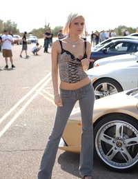 Cute golden-haired Christine flashing her petite tits and ass crack at a car show