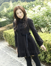 Fully clothed Japanese teen pretties in the park in black clothes and stockings
