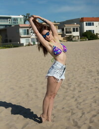 Seductive amateur Elizabeth Marxs doffs bikini at the beach to sun her tits