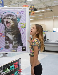 Teen girlfriend Uma Jolie flashing her titties and her ass in a toy store