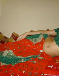Indian solo girl slides upskirt panties aside before showing her bare breasts