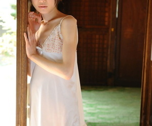 Hidden Japanese girl Aoba Itou models non nude in satin underclothes