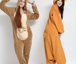 Sweet young Emily coupled with the brush pal doff their onsies thither behave oneself hot asses unfold