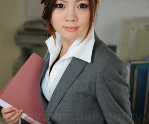 Beautiful Japanese businesswoman Iroha Kawashima exposes her brassiere at work