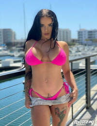 Curvy stunner Payton Preslee flaunting her thick orbs in a pinkish bikini