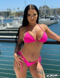 Curvy stunner Payton Preslee flaunting her thick orbs in a pinkish bikini