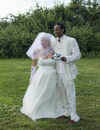 Mature bride Lacey Starr blows off her black groom after the wedding ceremony
