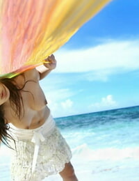 Devours Japanese teenage Honoka exposes nice tits and thicket during a day at the beach