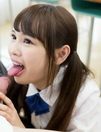 Tiny Asian schoolgirl gets spunk on her tongue while sucking her teachers hard-on