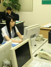 Japanese secretary Ruri Shinohara masturbates after work during a cam show