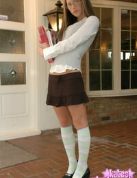 Nerdy schoolgirl strips to flats and knee high socks on the front porch
