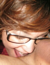 Barely legal teen Holly Michaels giving ball biting BJ while wearing glasses