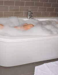 Naked older woman Dimonty gets caught while taking a nicely-shaped bath