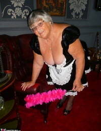Big old maid Grandma Libby doffs her uniform to pose bare in blossom