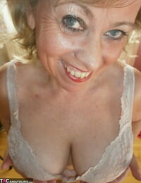 Horny granny Caro in high high-heeled slippers flaunting sadism armpits & mature sack of babymakers