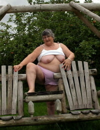 Old British lady Grandma Libby exposes her tits on a backyard bench sway