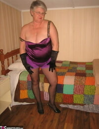 Old fatty Girdle Goddess gets naked in her bedroom while wearing black gloves