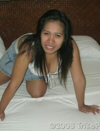 Filipina gal exposes her thick all congenital hooters on a sofa inwards a motel bums