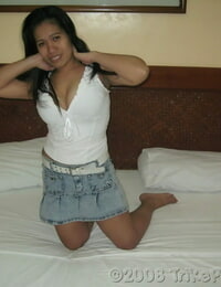 Filipina gal exposes her thick all congenital hooters on a sofa inwards a motel bums