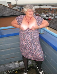 Huge UK nan Grandma Libby bares her knockers on a balcony before getting ballsack nude