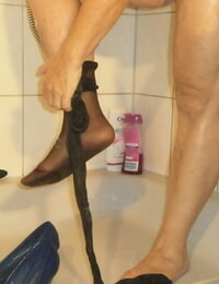 Unexperienced grandmother Caro liquidates her wet garment while taking a shower