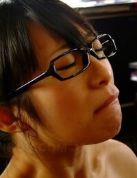 Sexy Asian babe in glasses Nana Kunimi gives fellatio and eats cum