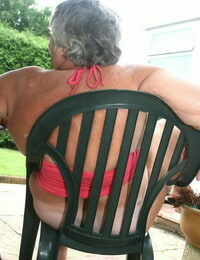 Thick oma Grandma Libby licks a nip before baring her fat ass on a patio